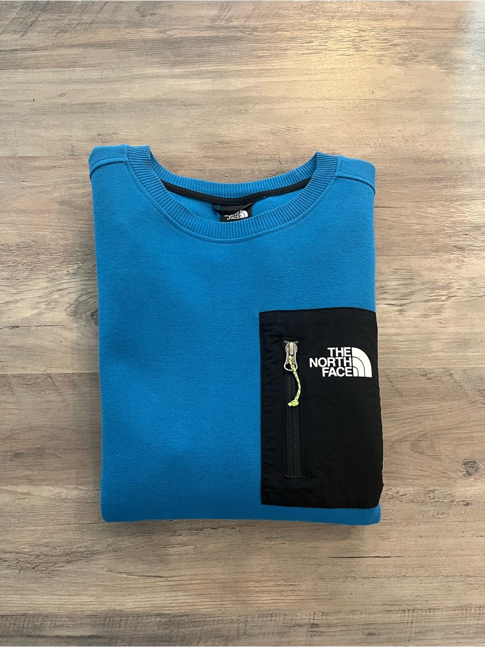 The North Face Men's Teal Blue Crewneck with Black Zip Pocket